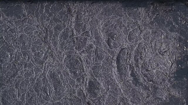 Wastewater treatment plant drone view, aerial shot of purification tanks with bubbling water.