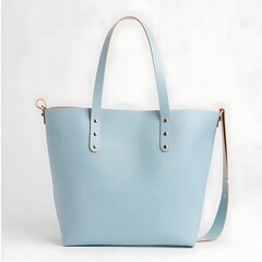 Elegant light blue leather tote bag isolated on a clean white background
