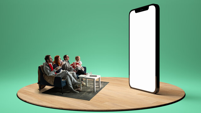 Family in pajamas watches 3D render of giant smartphone screen with blank display in suspenseful silence. Composite image. Collage. Concept of news, movies, entertainment, media