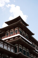 A large building with a steeple and a lot of windows