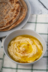authentic hummus with delicious prata or also known as roti canai