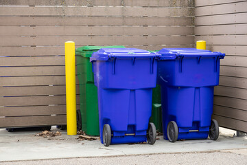 Green  and blue containers for separating  waste. Ontario, Canada