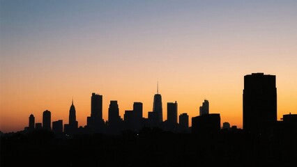 City skyline silhouette against a warm dusk sky, urban simplicity meets serene twilight.