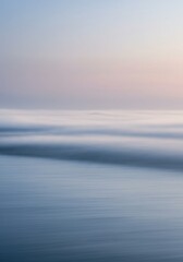Abstract Seascape: Soft Pastel Hues of Ocean Waves at Dawn