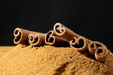 Fine Ground Cinnamon with Cinnamon Sticks. Natural Cooking Spice