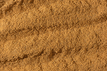 Texture of Ground Cinnamon. Natural Culinary Background Top View