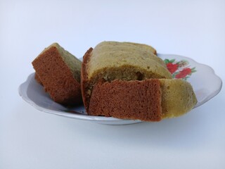 A plate of banana cake, a traditional Indonesian cake made from bananas as the main ingredient, has a soft texture and sweet taste