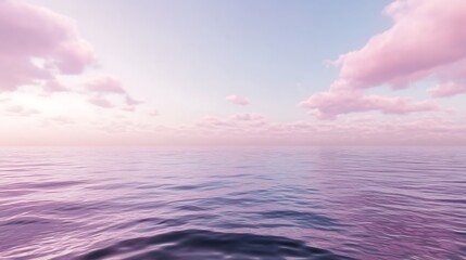 Serene ocean view at sunset with soft pink clouds reflecting on calm waters.
