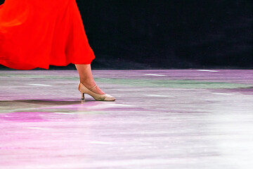 girl in junior dance dress for standard program at tournament