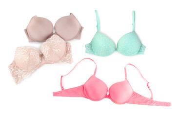 Bras of different colors isolated on white, collage. Top view