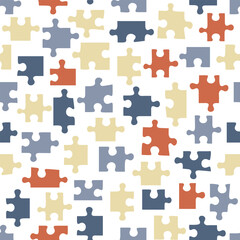 Seamless pattern with puzzle concept in the form of colored pieces on a white background.
