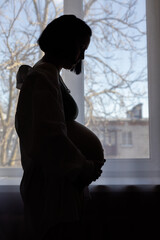 Late pregnant woman. Expectant mother tired of overweight, depression, stress the waiting period, the fear of childbirth