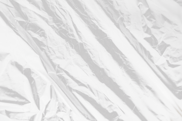 plastic overlay texture of crumpled transparent plastic film wrap on black background,wrinkled stretched plastic effect.