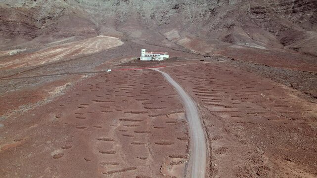 Aerial footage of Villa Winter in Fuerteventura with mountain backdrop