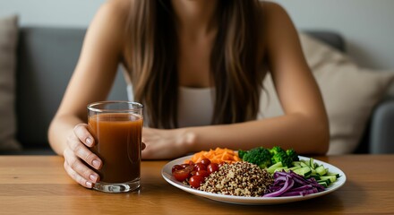 Woman Eats Healthy Meal with Juice, Quinoa, and Vegetables