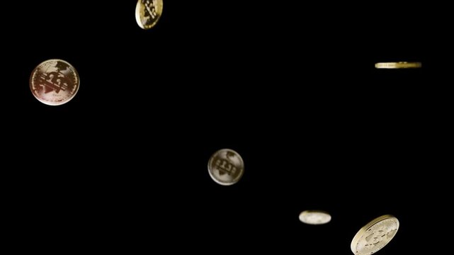 Golden bitcoins swirl on black background. 4k, slow motion.