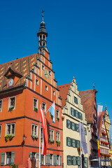 Old historic buildings with flags in the old town of Dinkelsbühl