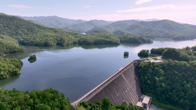 aerial push in to fontana dam and reservoir