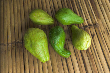 Chayote green vegetable fresh on bamboo table