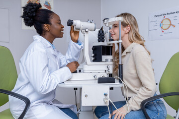 Young woman having a vision exam at the optometrist