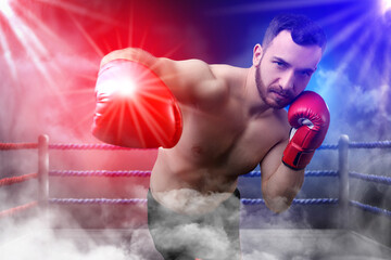 Boxer surrounded by smoke fighting in ring. Sporting event