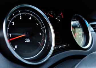 Car Tachometer and Dashboard Close-Up