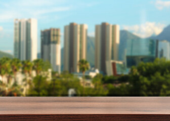 Fototapeta premium Empty table near window with city view in office