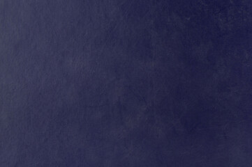 Fototapeta premium Rough dark blue paper background