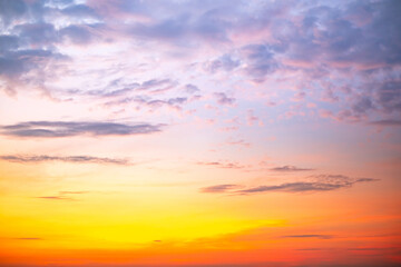 Fototapeta premium Beautiful , luxury soft gradient orange gold clouds and sunlight on the blue sky perfect for the background, take in evening,Twilight, Large size, high definition landscape photo