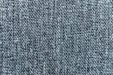 Close-up texture of textile surface. Extreme macro close-up of synthetic fabric surface.
