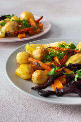 Enjoy a healthy and delicious breakfast or lunch featuring baked vegetables like potatoes, zucchini, carrots, and beets, providing a nutritious and flavorful meal for any time of day