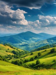 Fototapeta premium Rolling green hills and mountains under a blue sky with clouds landscape aerial view scenic vista
