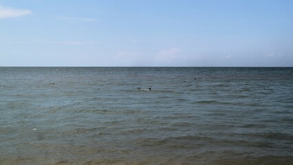 Seascape with ripple from low perspective, perfect for  hobbies, healthy, or relaxation advertising