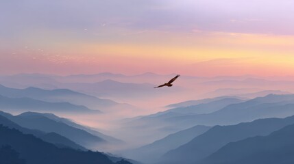 Fototapeta premium Eagle soars over misty mountain range at dawn aerial view nature landscape scenic flight freedom
