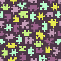 Seamless pattern with puzzle concept in the form of colored pieces. Vector design.