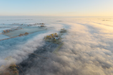 Sailing start tower in morning fog on Sneekermeer, Friesland