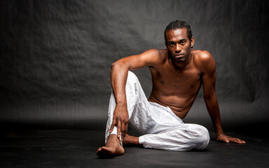 Capoeira artist. A relaxed and confident pose from a capoeira martial arts character. From a series...