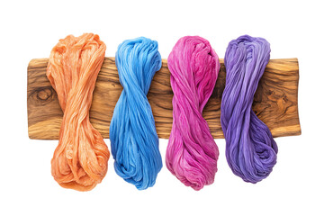 Colorful twisted fabric threads isolated on white background isolated on a white background