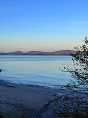 Port Charlotte is a town on the west coast of Islay, Scotland. Whisky distilleries and hotels dot the area, with scenic shorelines and historic charm.