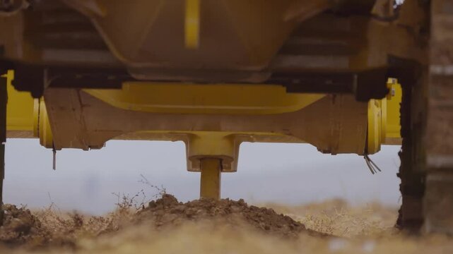 Agricultural machinery loosens the soil close up