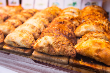 Delicious freshly baked empanadas with different fillings for sale
