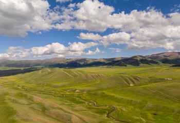 A view from a quadcopter of the picturesque mountain plateau of Asy in the Almaty region in...