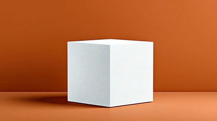 Blank white cube display on orange background.