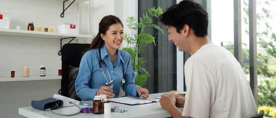 Health and Wellness. Doctor and patient sharing a positive interaction during a consultation.