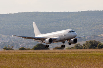 Passenger Jet Landing. Commercial Airliner on Final Approach to Runway. Aviation and Travel.