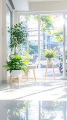 Fototapeta premium Sunlit interior with potted plants, a small stool, and a large window showcasing a bright, outdoor scene