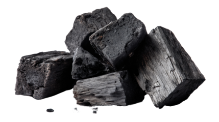 Charcoal Briquettes: A close-up shot of several black charcoal briquettes, ideal for grilling or fire starting. The texture and color are clearly visible.