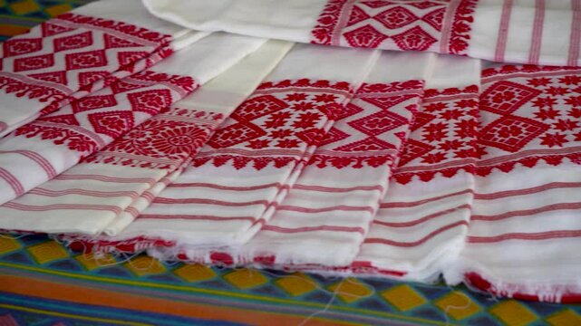 Bihu gamosa of Assam pan shot with variety floral design mid close up shot