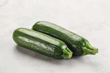 Raw green ripe zucchini vegetable