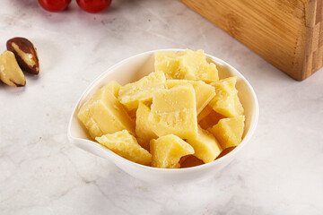 Crushed parmesan cheese in the bowl